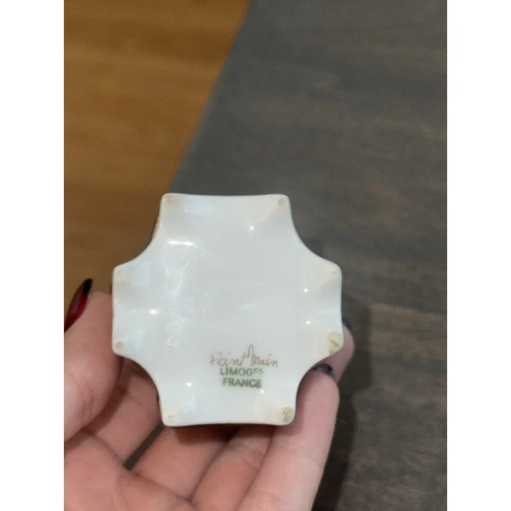Beautiful authentic vintage French Limoges porcelain footed trinket box.